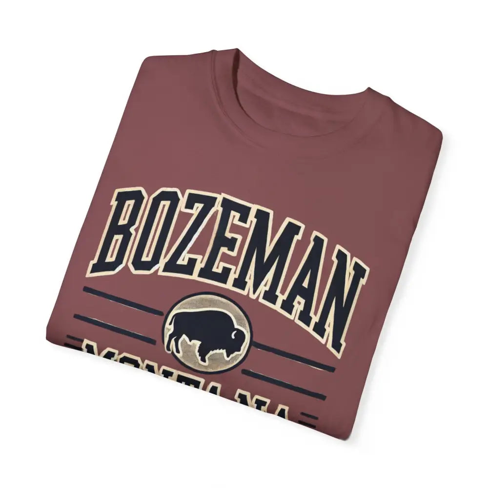 Folded mauve Bozeman Montana Bison Adventure Inspired Graphic Tee with buffalo graphic