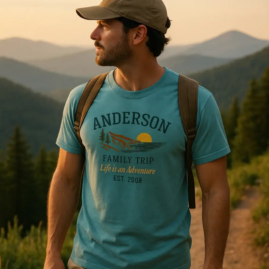 Blue short-sleeved custom mountain sunset t-shirt with graphic design for family trips