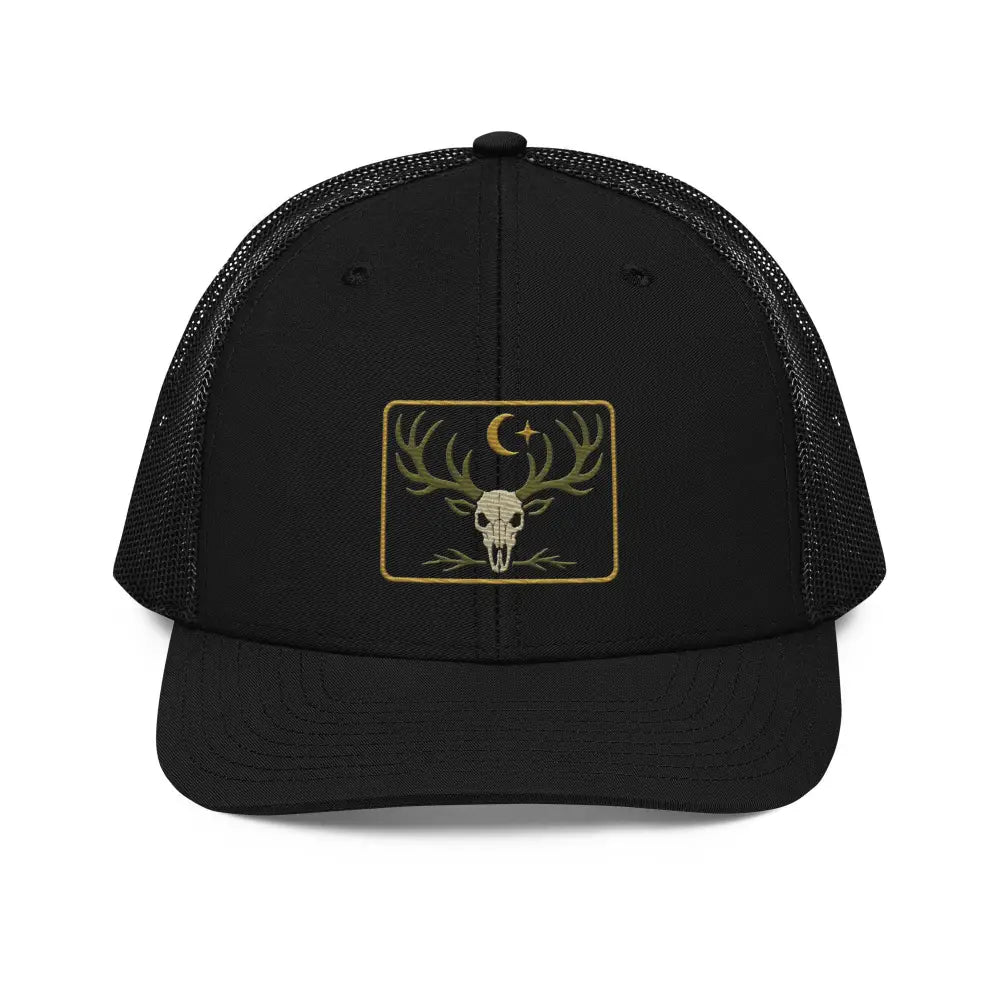 Black mesh-back trucker hat with embroidered heritage skull, deer antlers, and crescent moon