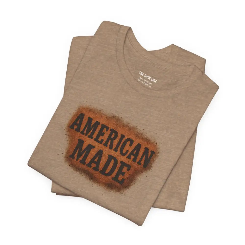 Folded light brown premium American Made graphic tee from Trini Skies Supply