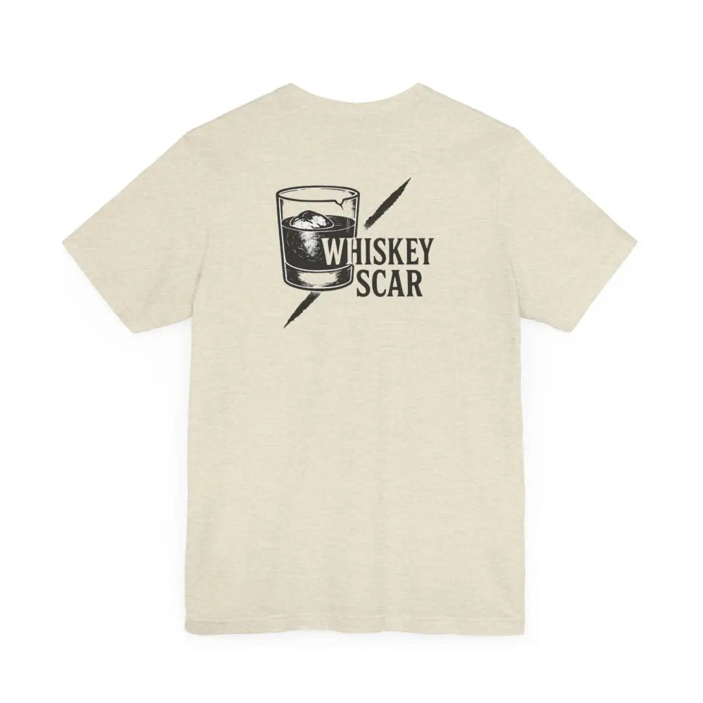 Cream-colored short-sleeved T-shirt with whiskey glass design from Trini Skies Iron Line Series