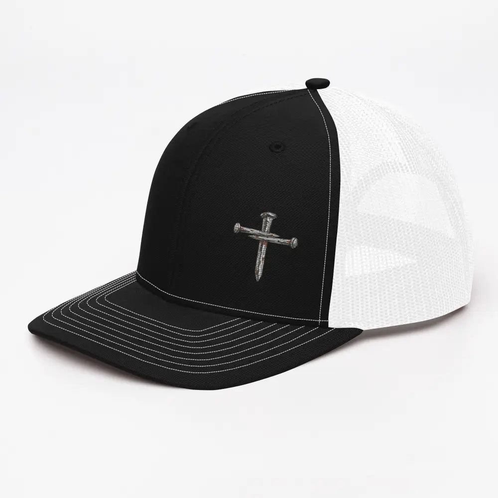 Black and white Richardson 112 trucker hat with nail cross embroidery
