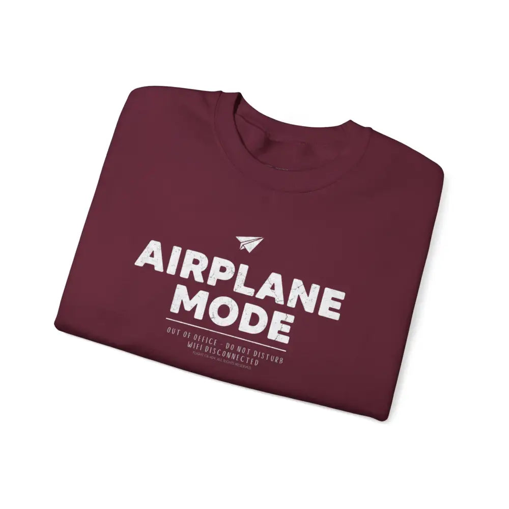 Maroon airplane mode crewneck sweatshirt with a travel graphic and out of office design