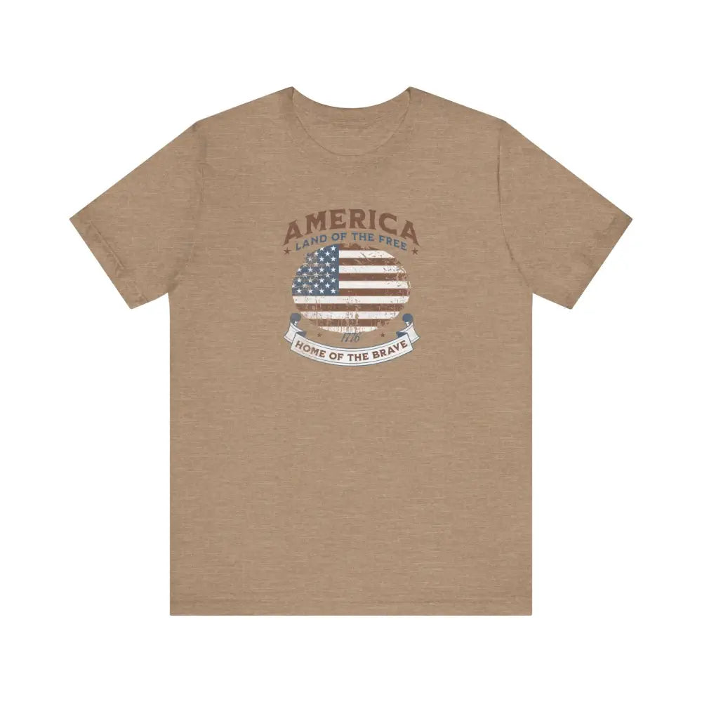 Light brown vintage t-shirt with distressed American flag graphic and patriotic design