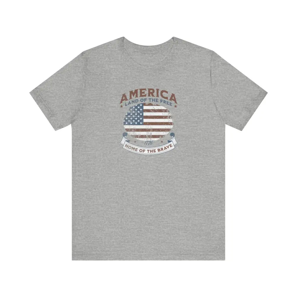 Heather gray vintage t-shirt with distressed American flag graphic and Trini Skies design