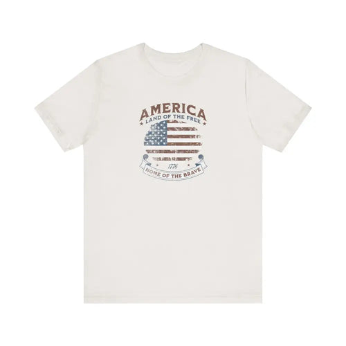 White short-sleeved Trini Skies vintage t-shirt with American flag graphic
