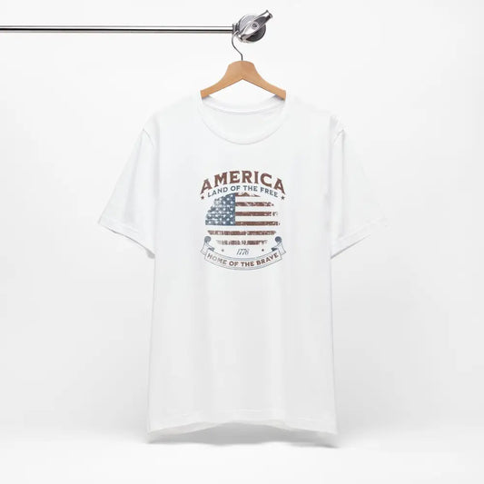 White short-sleeve vintage t-shirt with American flag graphic and Trini Skies design
