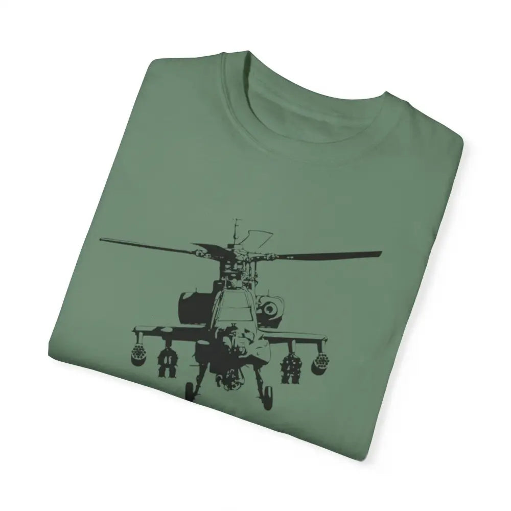 Folded olive green patriotic t-shirt with bold Apache helicopter graphic