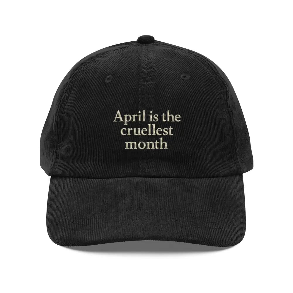 Black corduroy baseball cap with T.S. Eliot cruellest month quote embroidered design