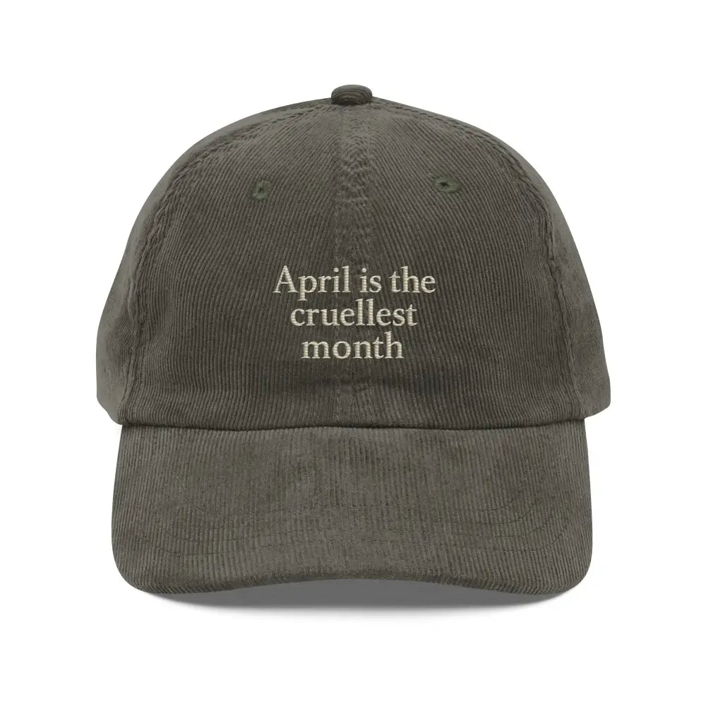 Dark green corduroy hat with April Is the Cruellest Month embroidery