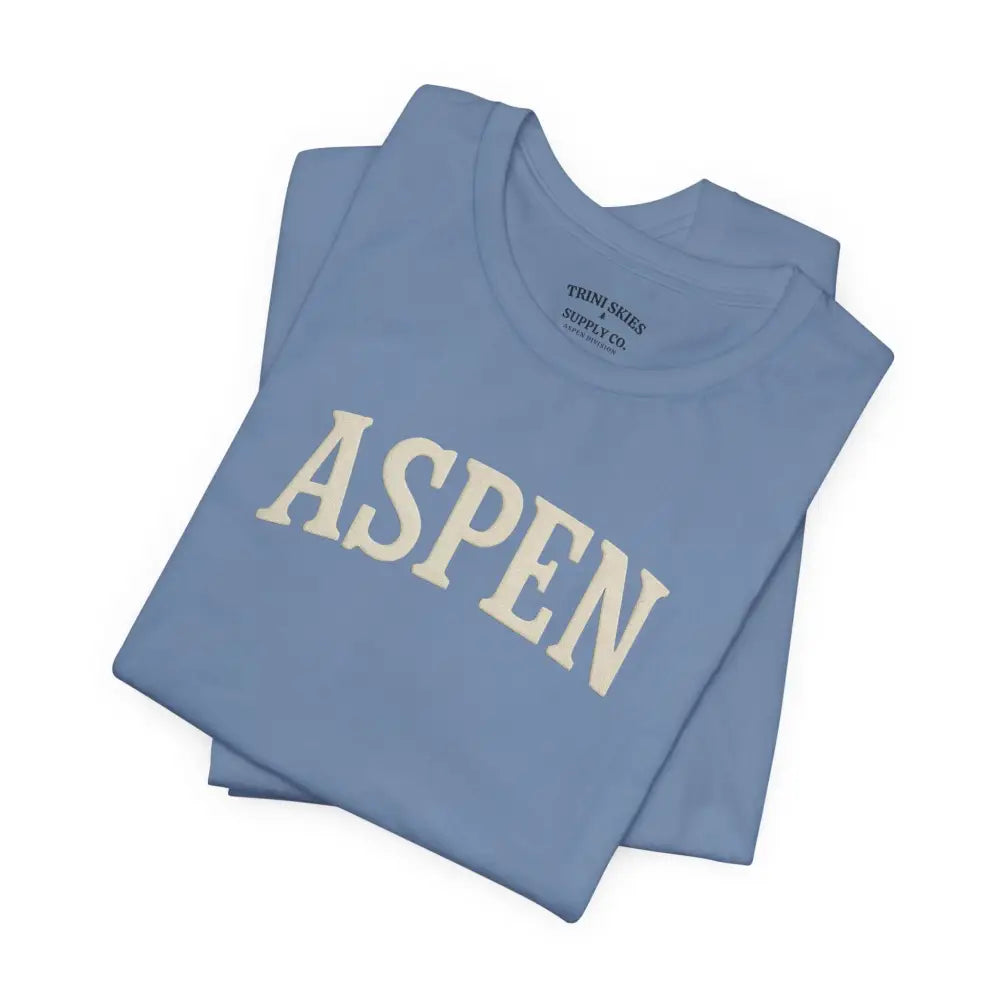 Light blue minimalist Aspen chest graphic tee with detailed DTG collegiate style