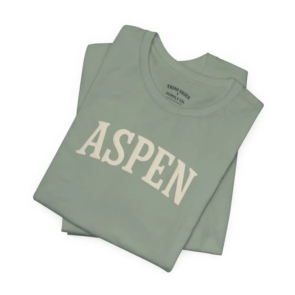 Minimalist Aspen chest graphic tee in light green with detailed DTG collegiate print