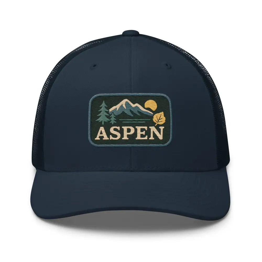 Dark blue Yupoong mesh snapback trucker hat with embroidered Aspen patch and corduroy details