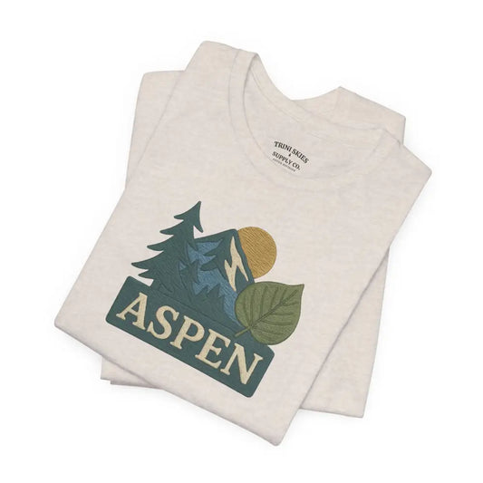 Cream-colored t-shirt with detailed dtg graphic of mountains and trees by Bella Canvas Aspen Division