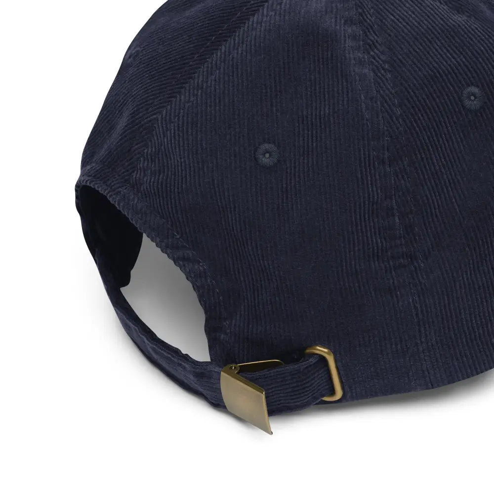 Navy blue corduroy embroidered hat with snow-capped peaks stitched and brass buckle adjustment