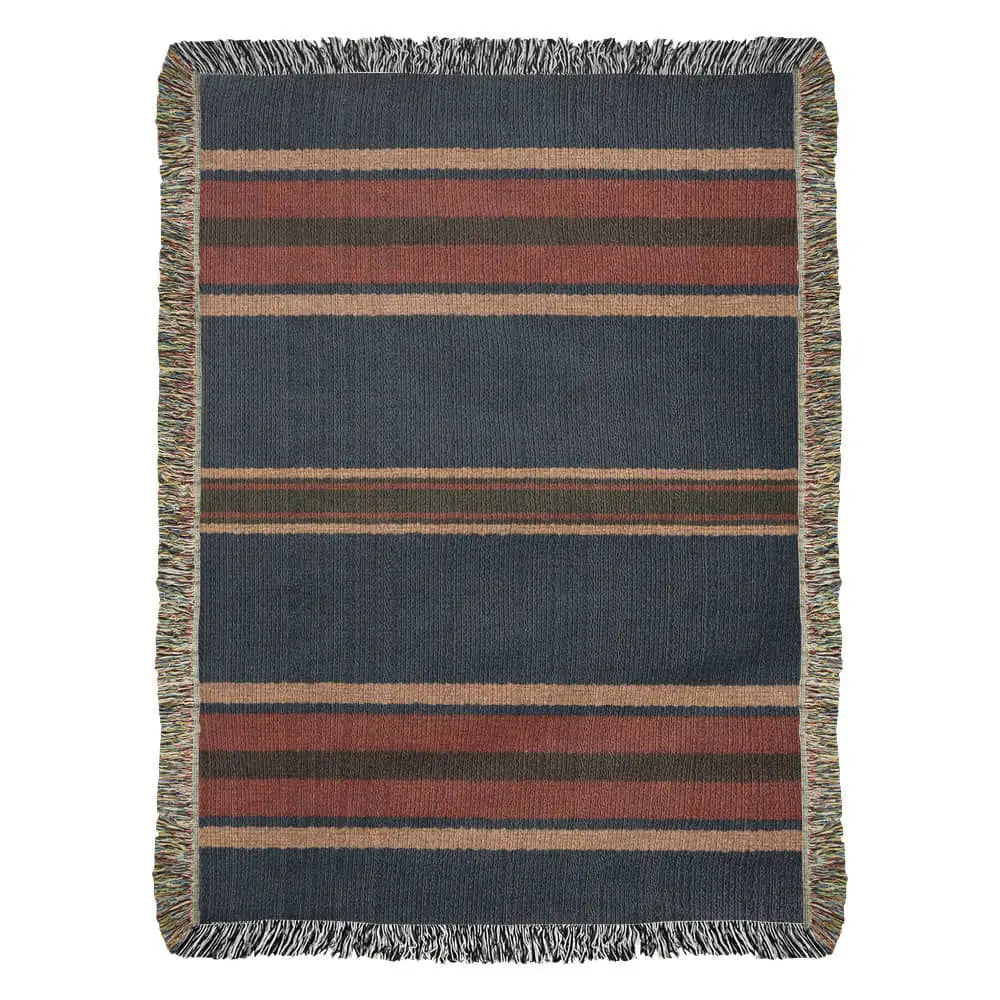 Cozy aspen stripe woven blanket in heritage travel textile with mountain lodge aesthetic