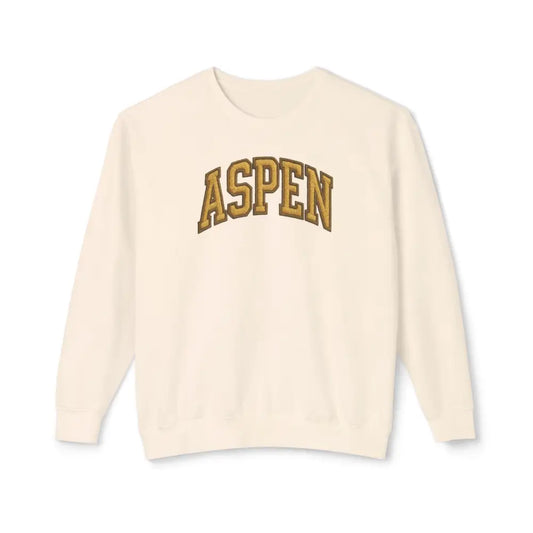 Cream-colored vintage Aspen crewneck sweatshirt with gold Aspen lettering, perfect for mountain-town style