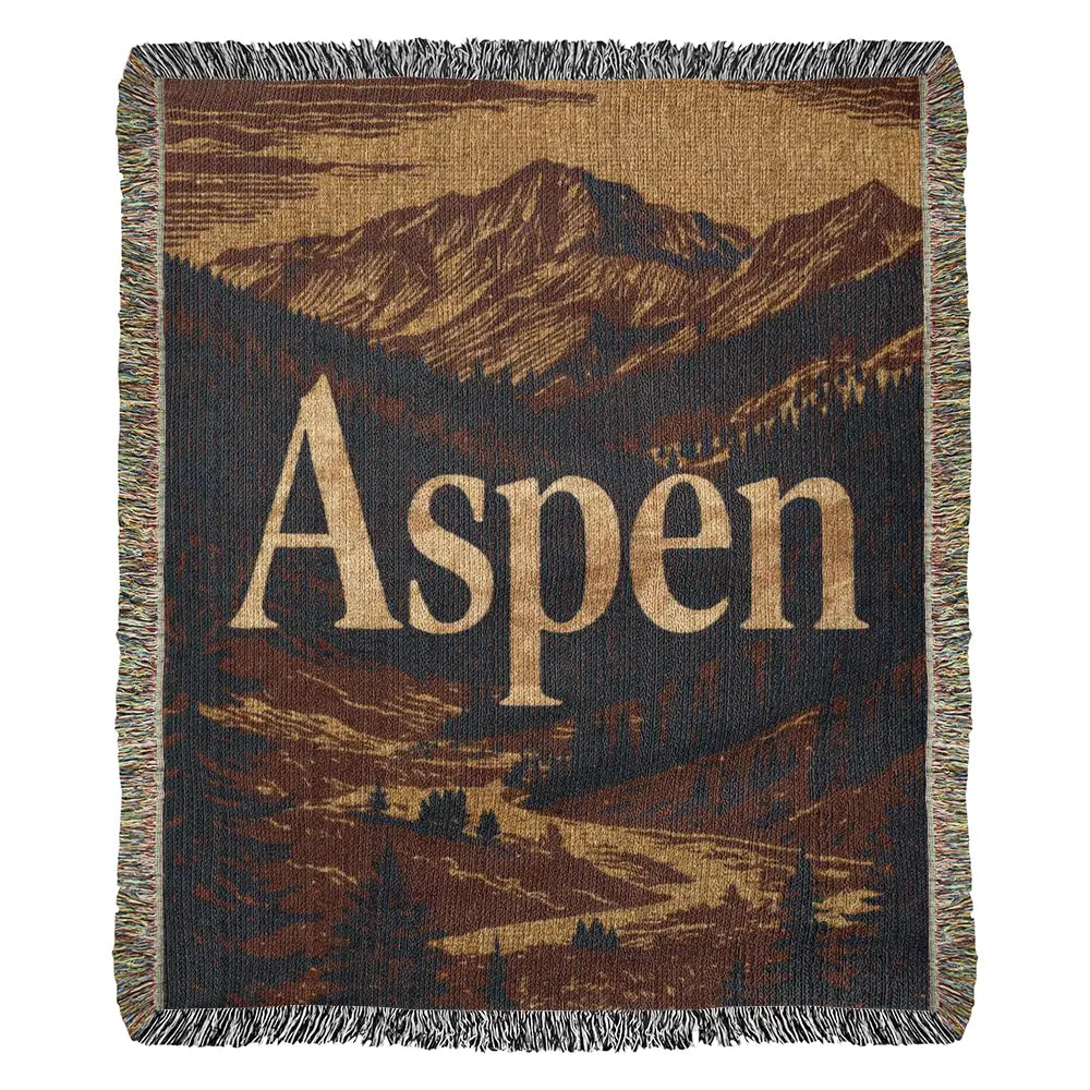 Aspen woven blanket in vintage travel-poster style mountain landscape