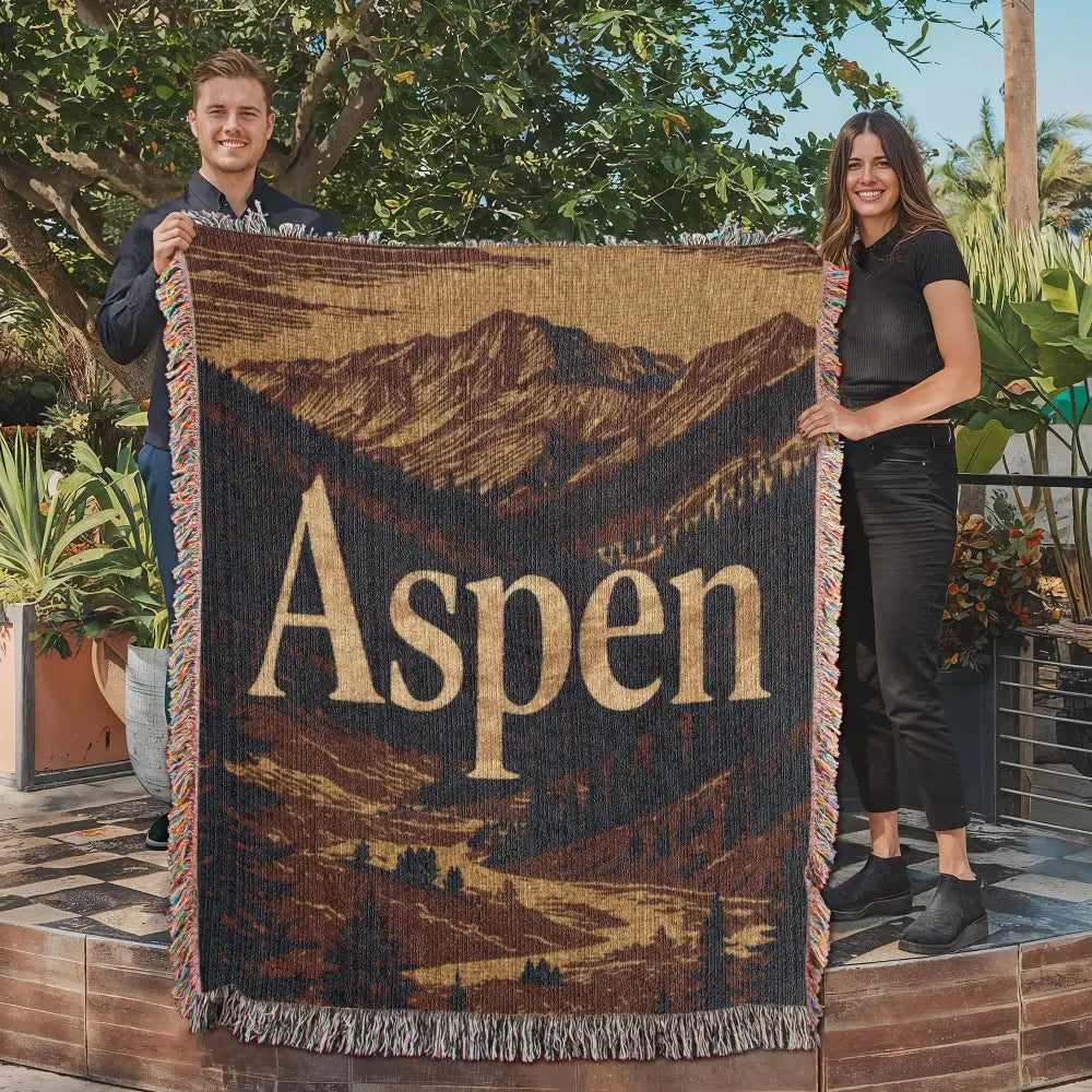 Brown and beige aspen woven blanket with mountain landscape design