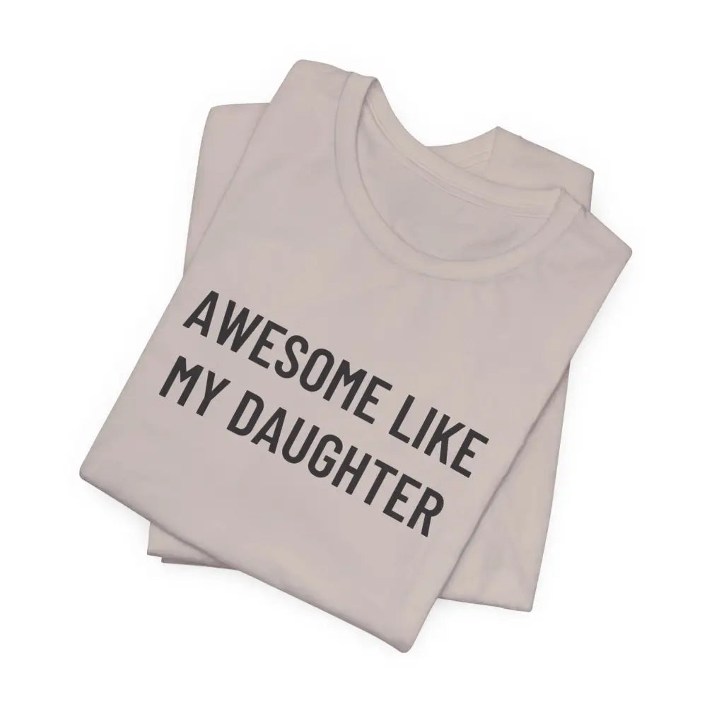 Folded light-colored crew-neck t-shirt with daughter funny graphic celebrating fatherhood