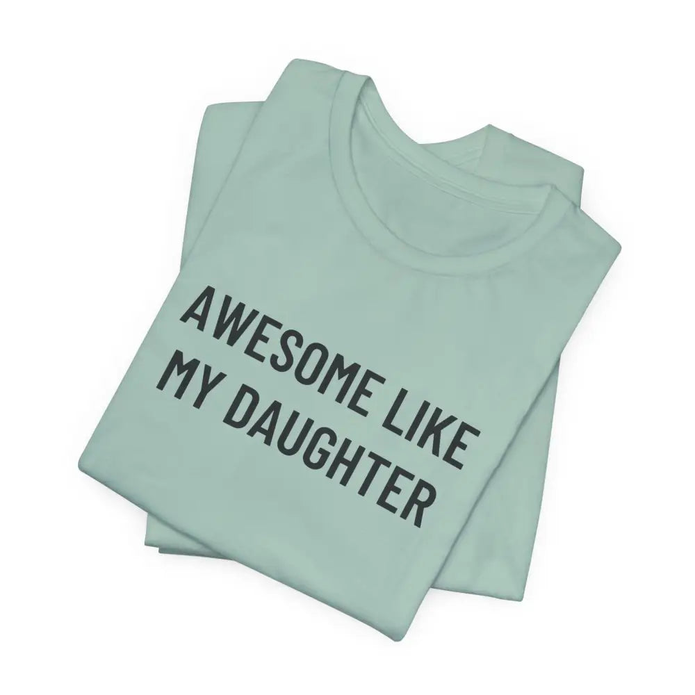 Light blue folded t-shirt with daughter funny graphic to celebrate fatherhood