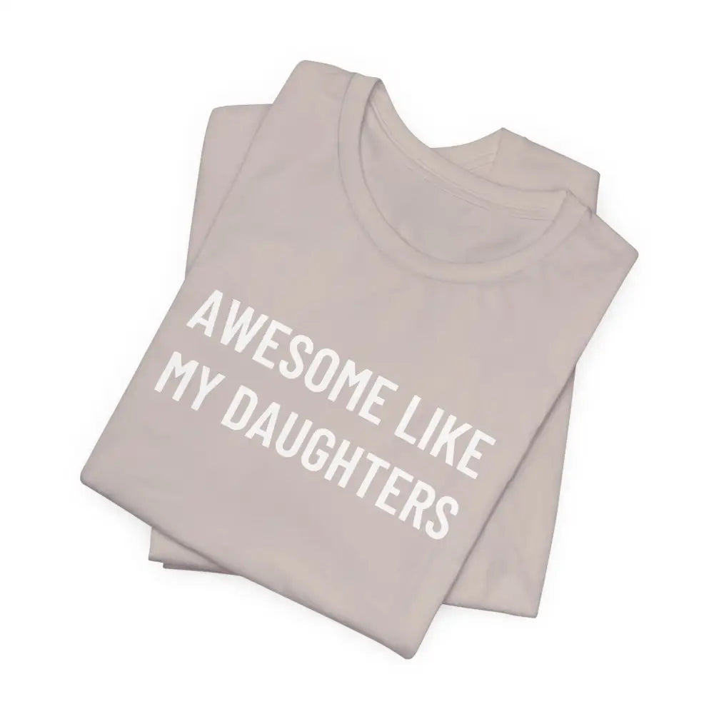 Folded light t-shirt with Awesome Like My Daughter graphic to celebrate fatherhood