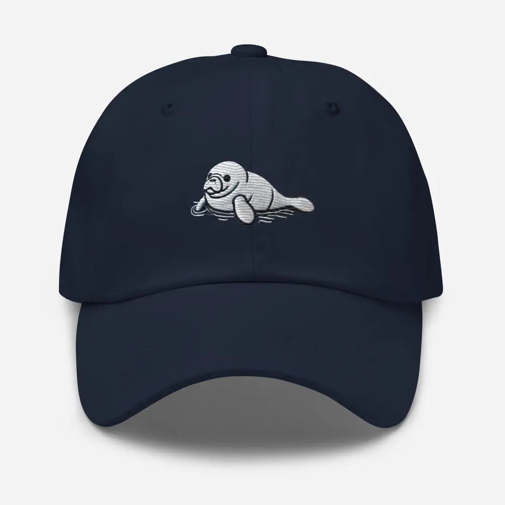 Navy blue baby manatee embroidered marine wildlife dad cap with Trini skies design
