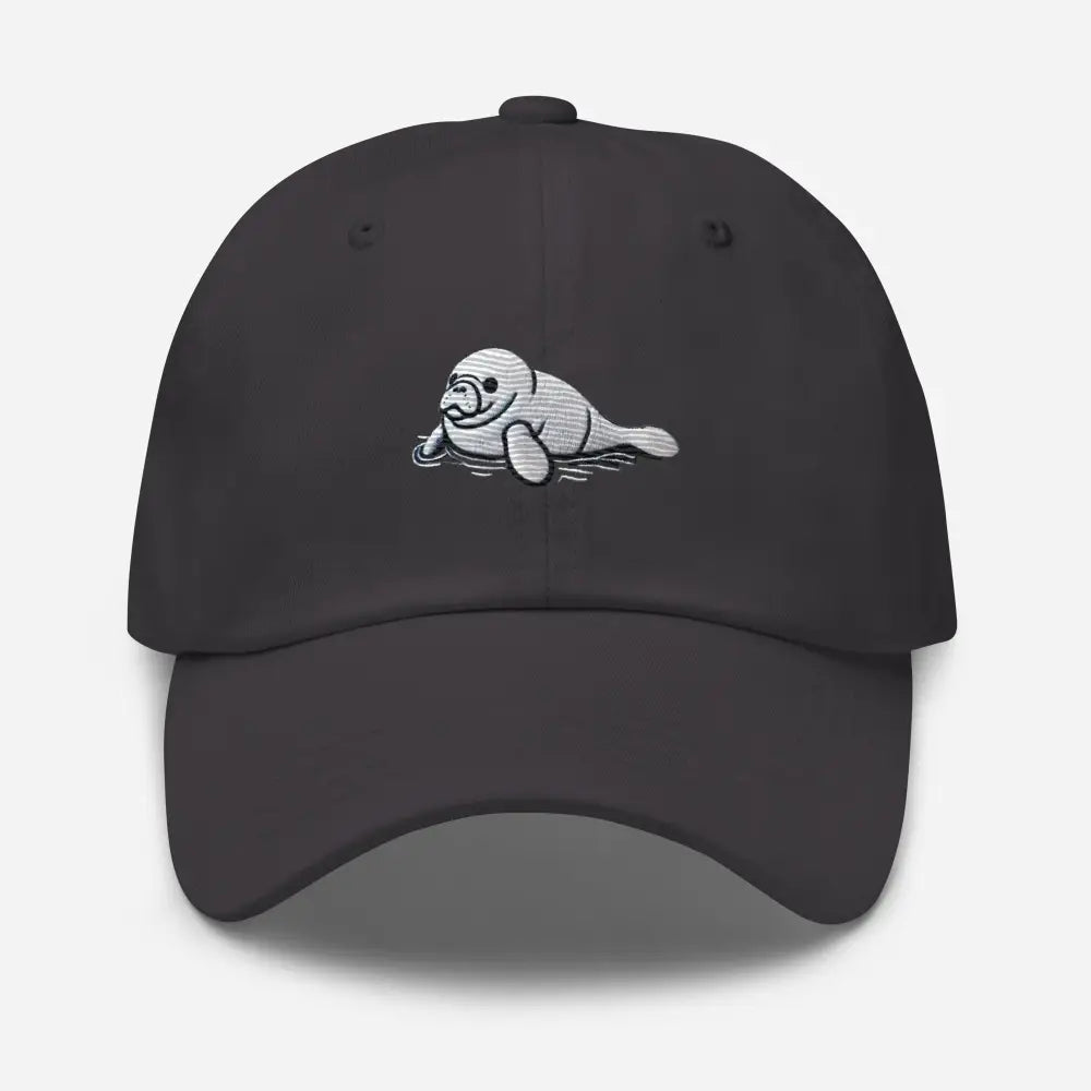 Dark gray baby manatee embroidered marine wildlife dad cap with Trini Skies branding