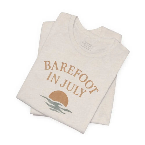 Folded cream t-shirt with vintage graphic for Trini Skies Supply July vintage tee