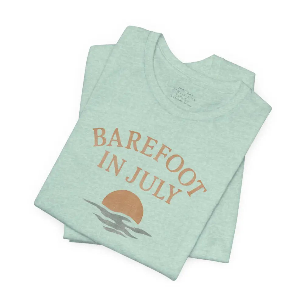 Light green July vintage tee with Barefoot in July graphic by Trini Skies Supply