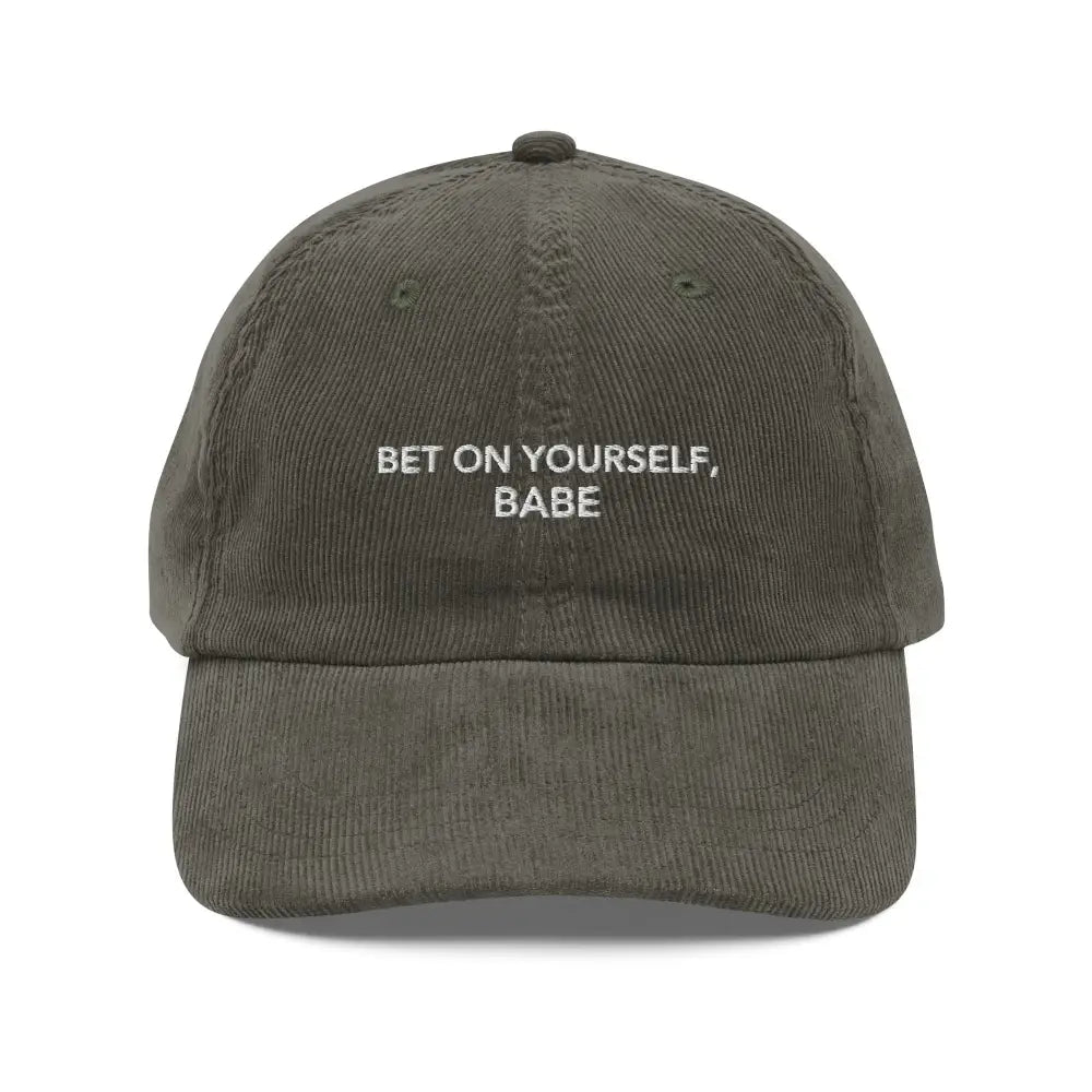 Trini Skies embroidered corduroy cap in olive green with white text