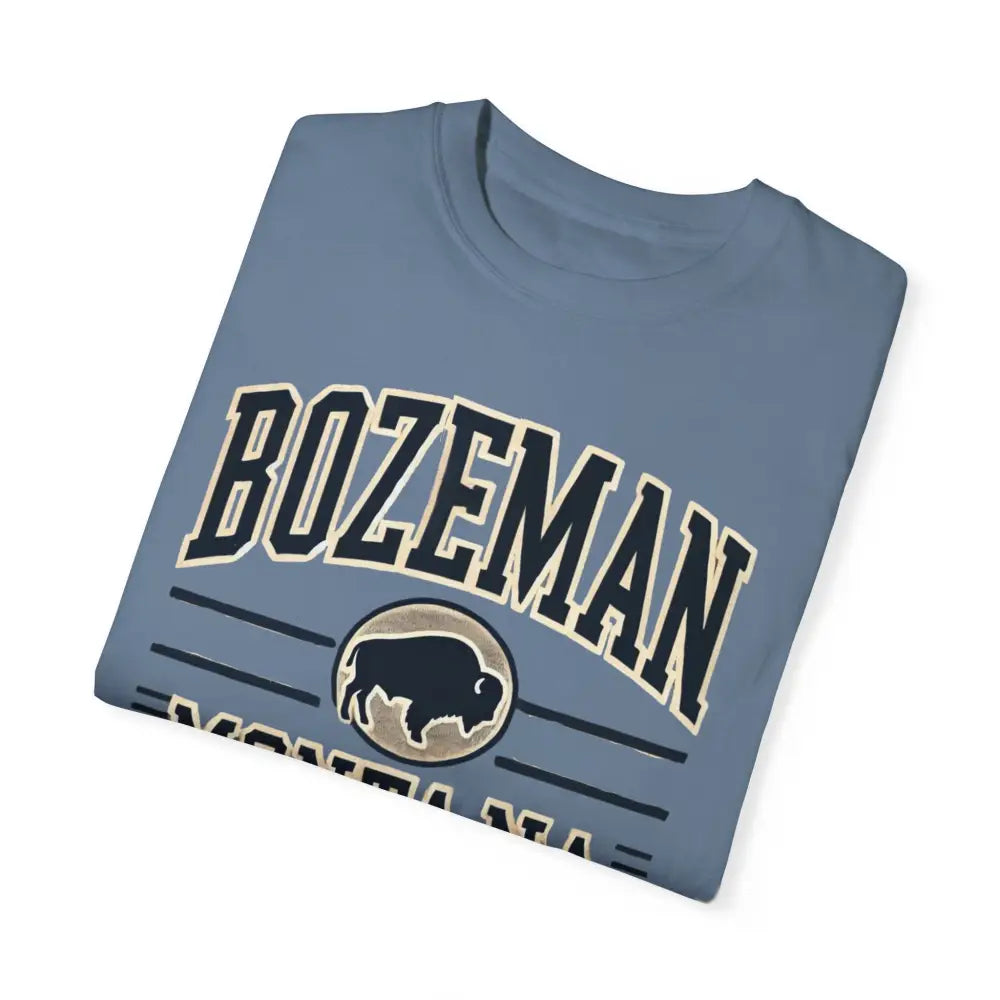 Folded blue Trini Skies Bozeman Montana graphic adventure inspired tee with bison