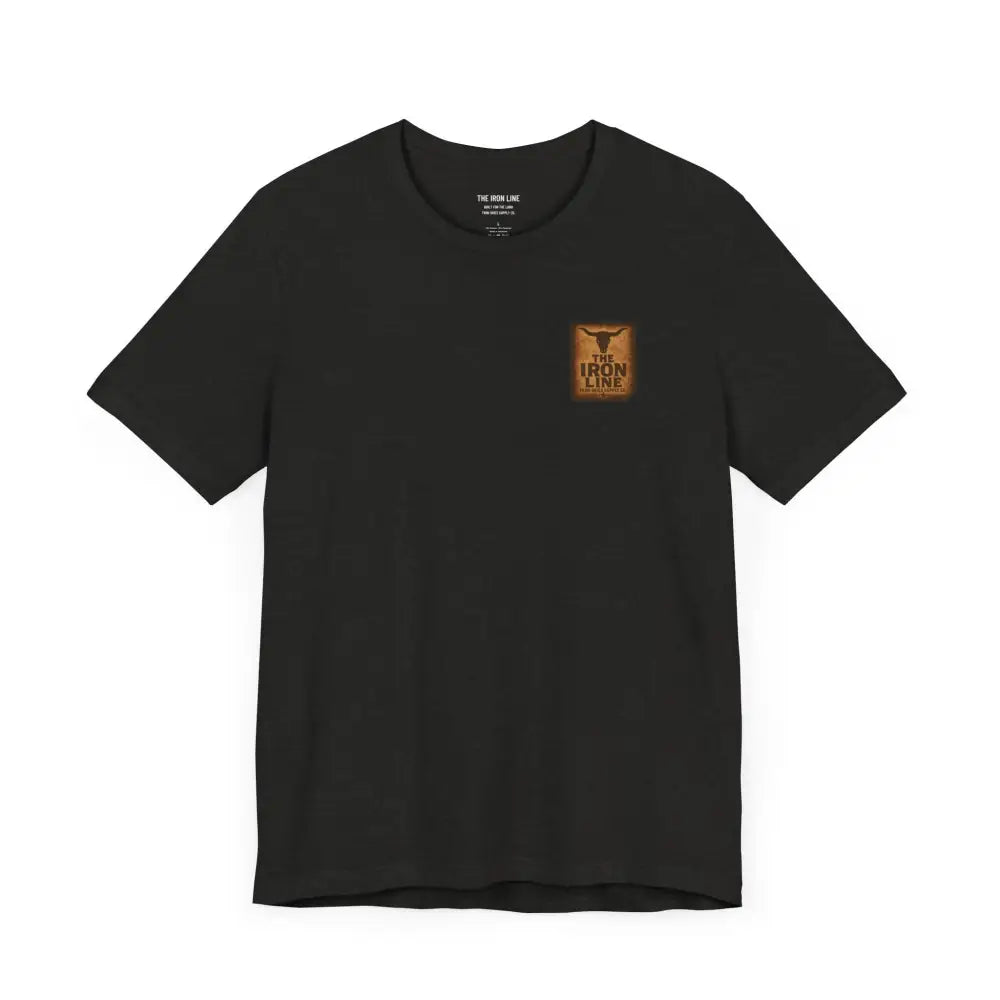 Black short-sleeved T-shirt with rectangular brown logo patch from Trini Skies Supply