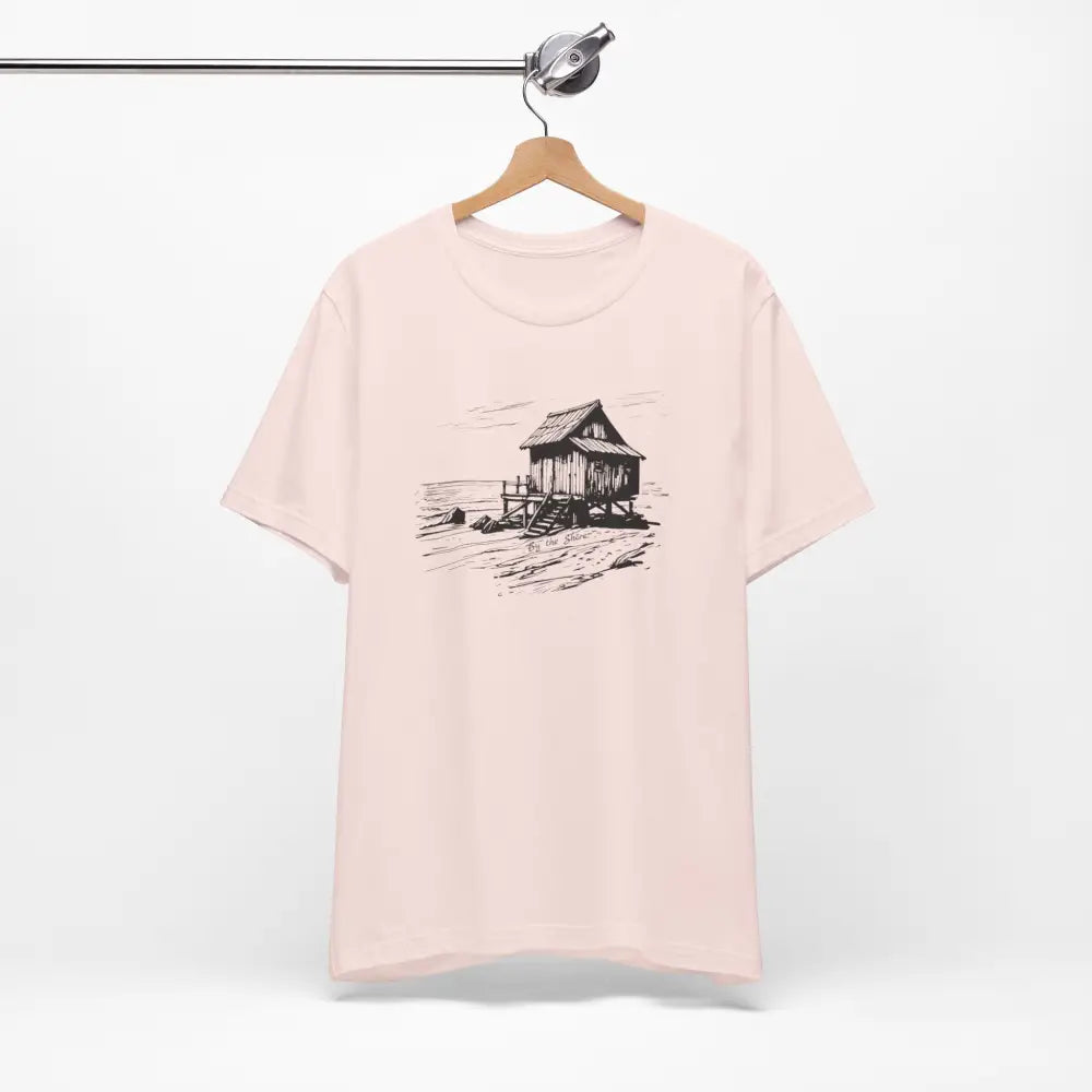 Trini Skies shore cabin tee: pink t-shirt with beach hut graphic