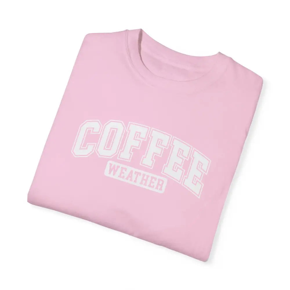 Folded light pink coffee weather winter-inspired graphic t-shirt