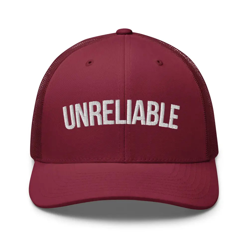 Custom embroidered Unreliable trucker hat with white text, adjustable snapback