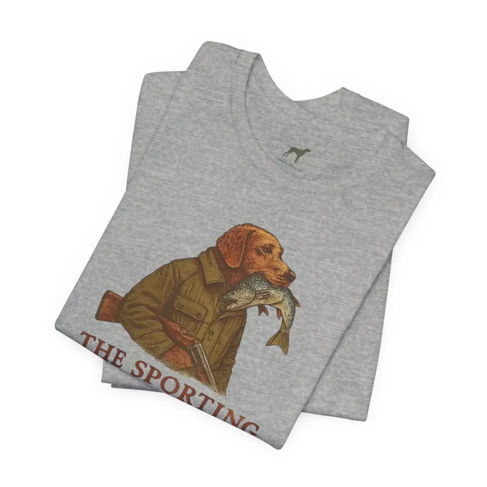 Folded gray Trini Skies dog fishing graphic tee celebrates timeless outdoor heritage