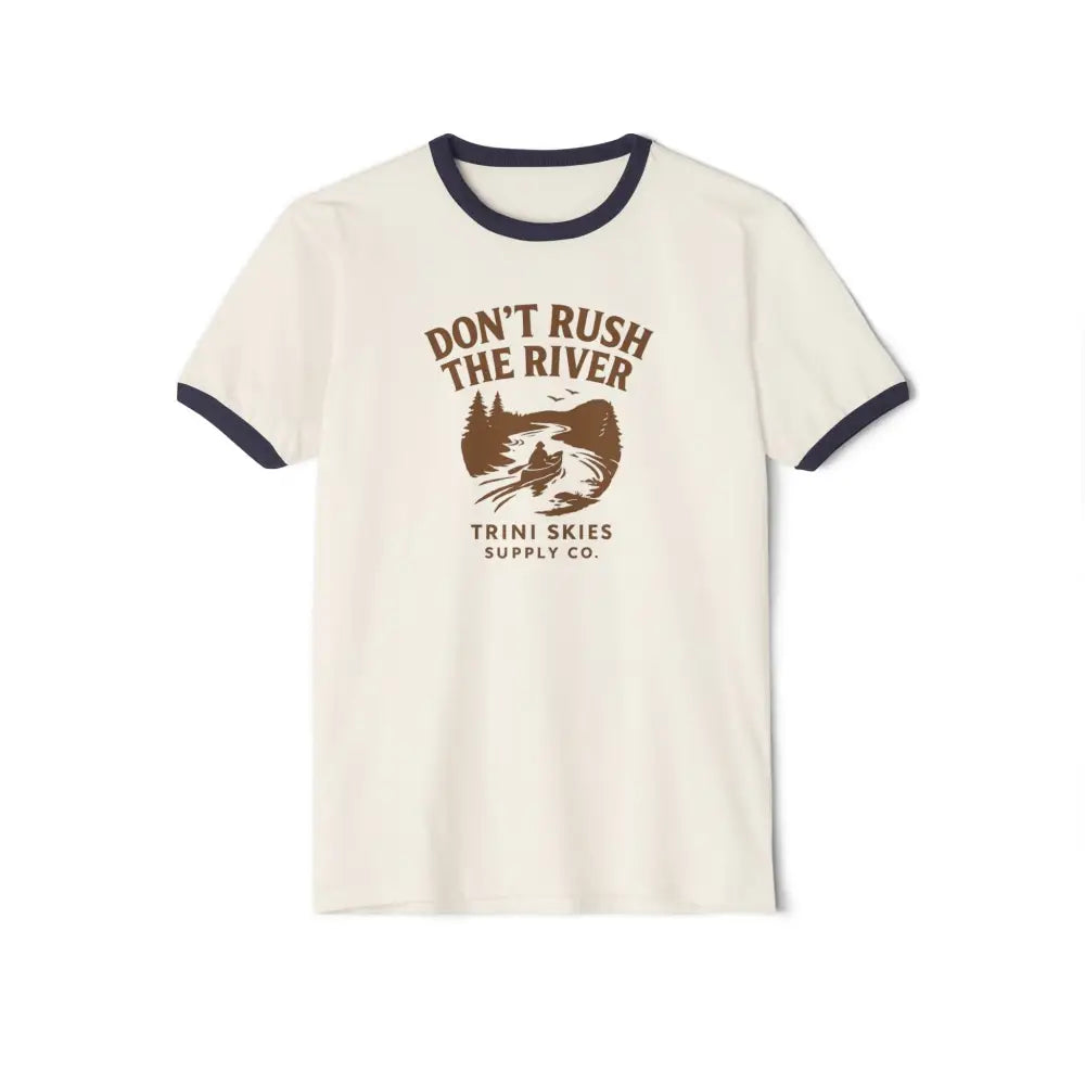 Cream-colored vintage-style outdoor graphic tee with river and trees design and Don’t Rush the River text