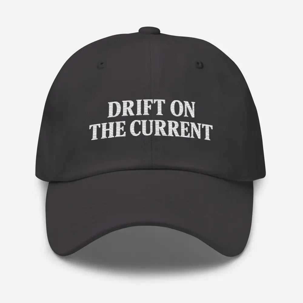 Trini Skies Supply premium Yupoong unstructured black dad cap with white Drift on the Current embroidery