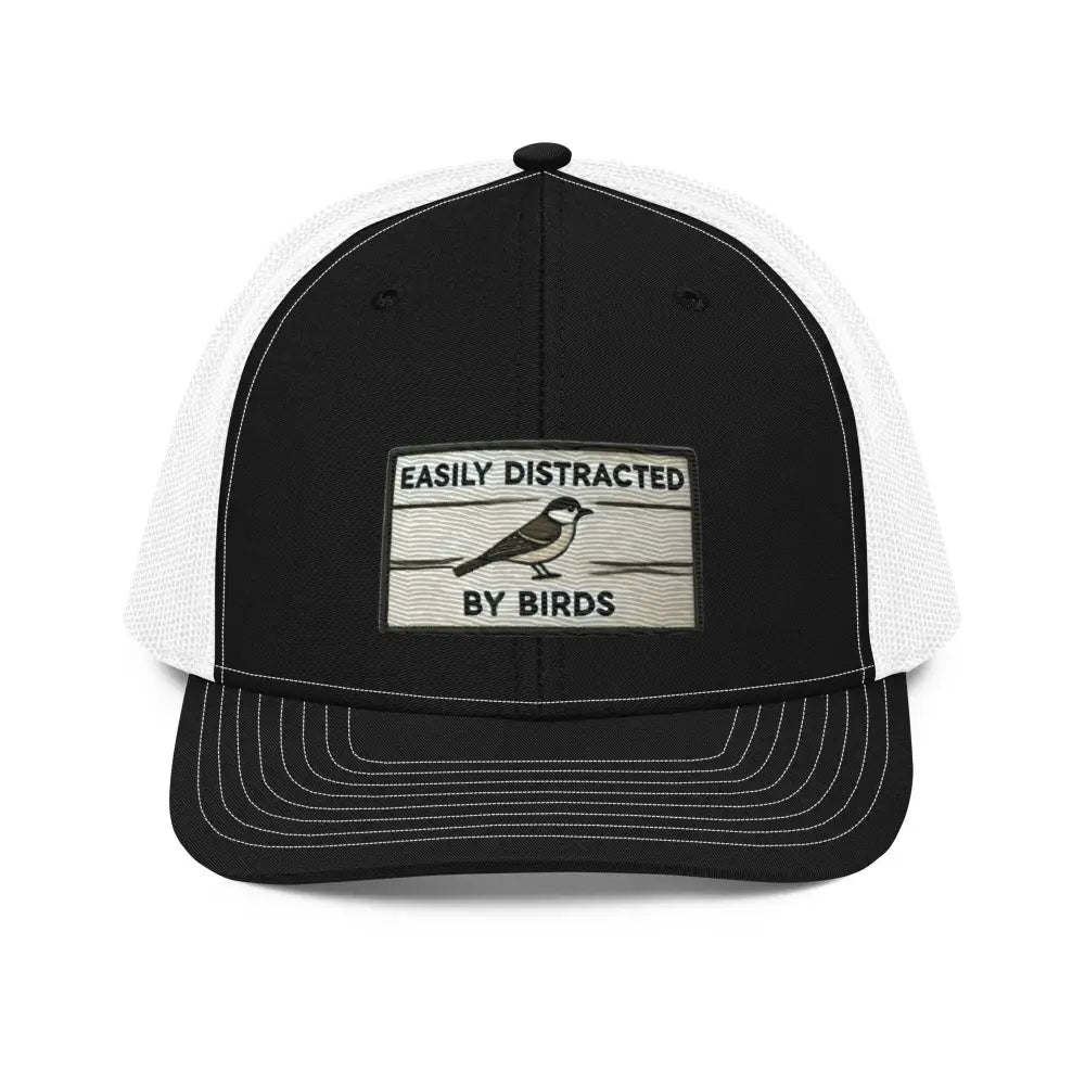Black mesh trucker hat with birds embroidered patch, Richardson style
