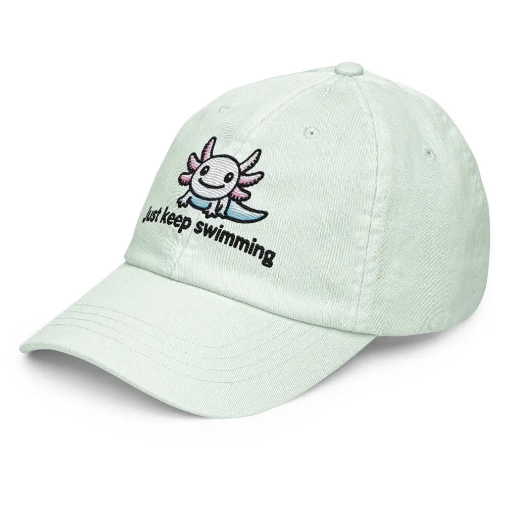 Light green pastel baseball hat with embroidered axolotl