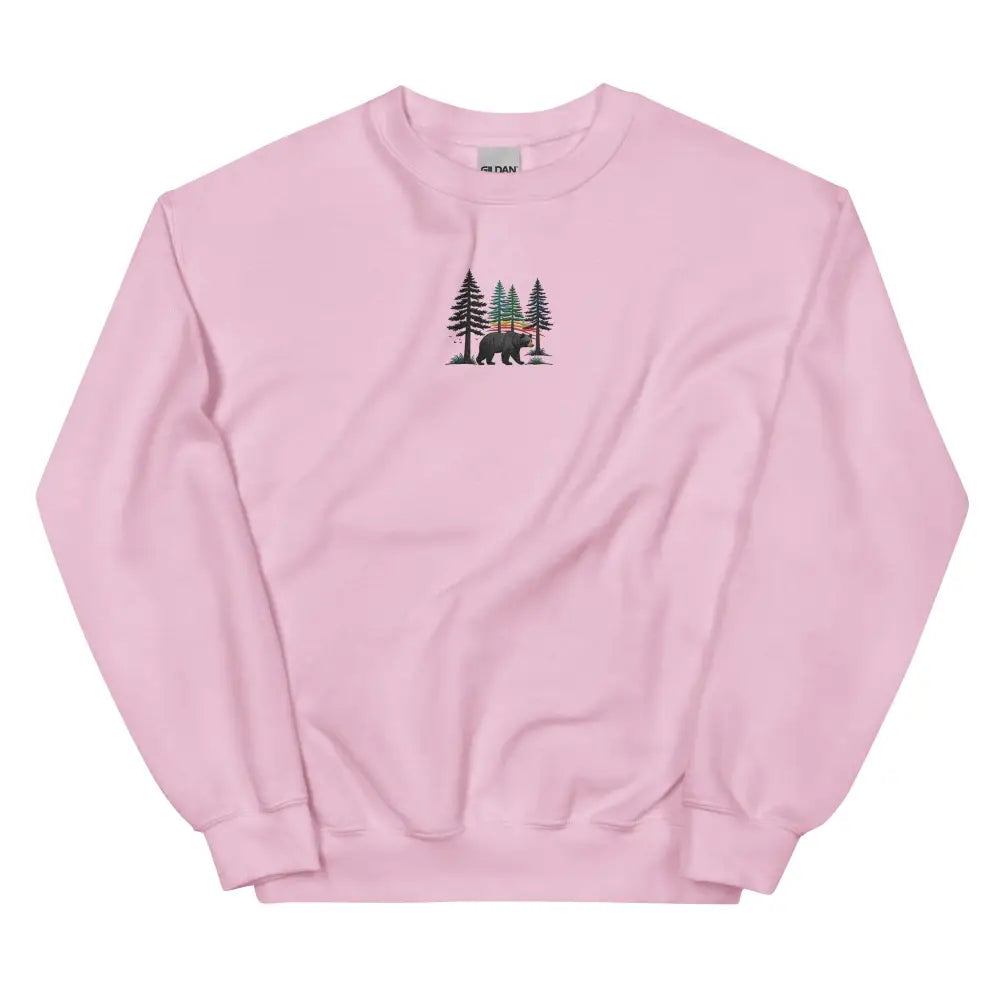 Pink embroidered forest sweatshirt with bear and pine tree graphic