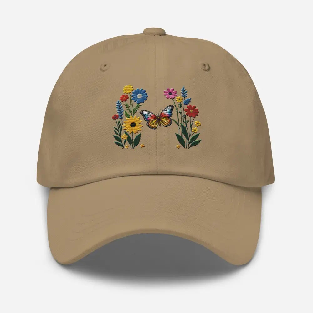 Tan flower dad hat with embroidered butterfly and colorful flowers embracing nature’s beauty