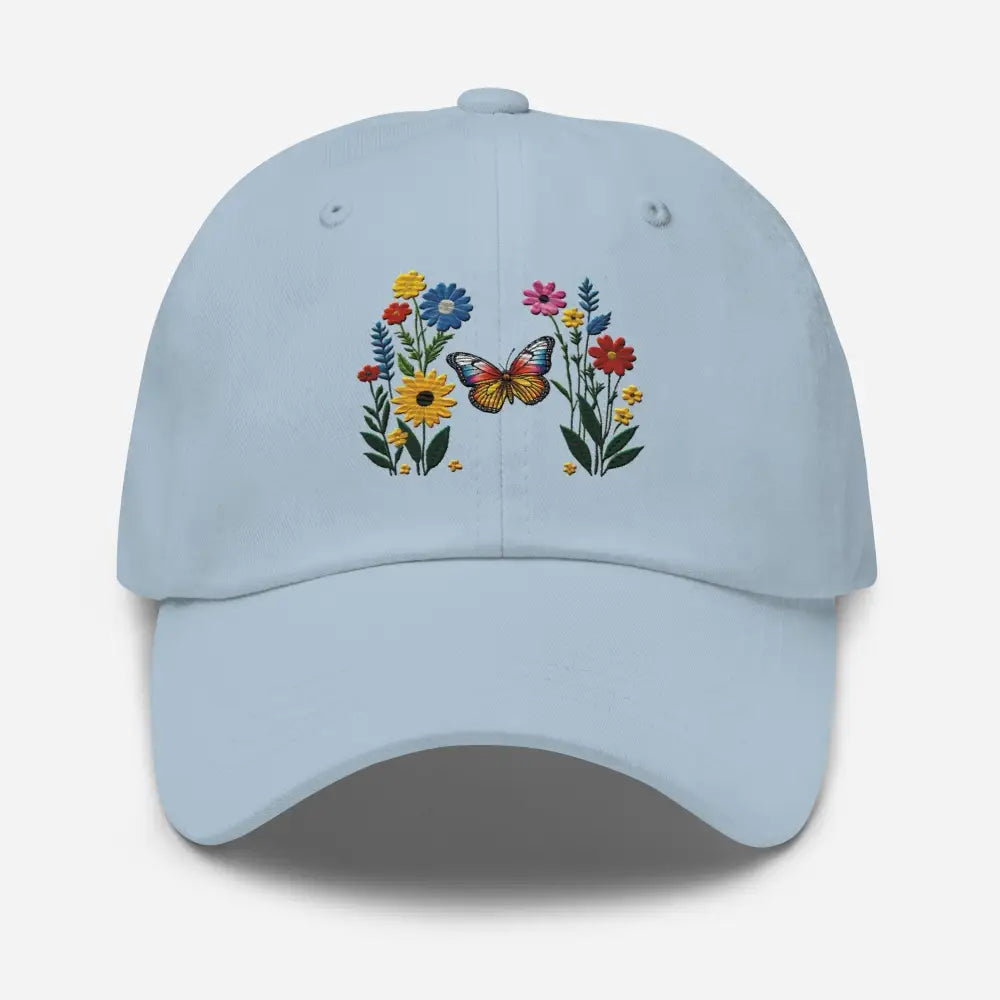 Light blue flower dad hat with embroidered butterfly design embracing nature’s beauty