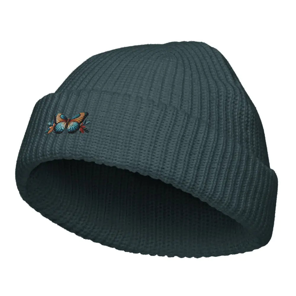 Trini Skies embroidered butterfly fisherman beanie in dark teal ribbed knit