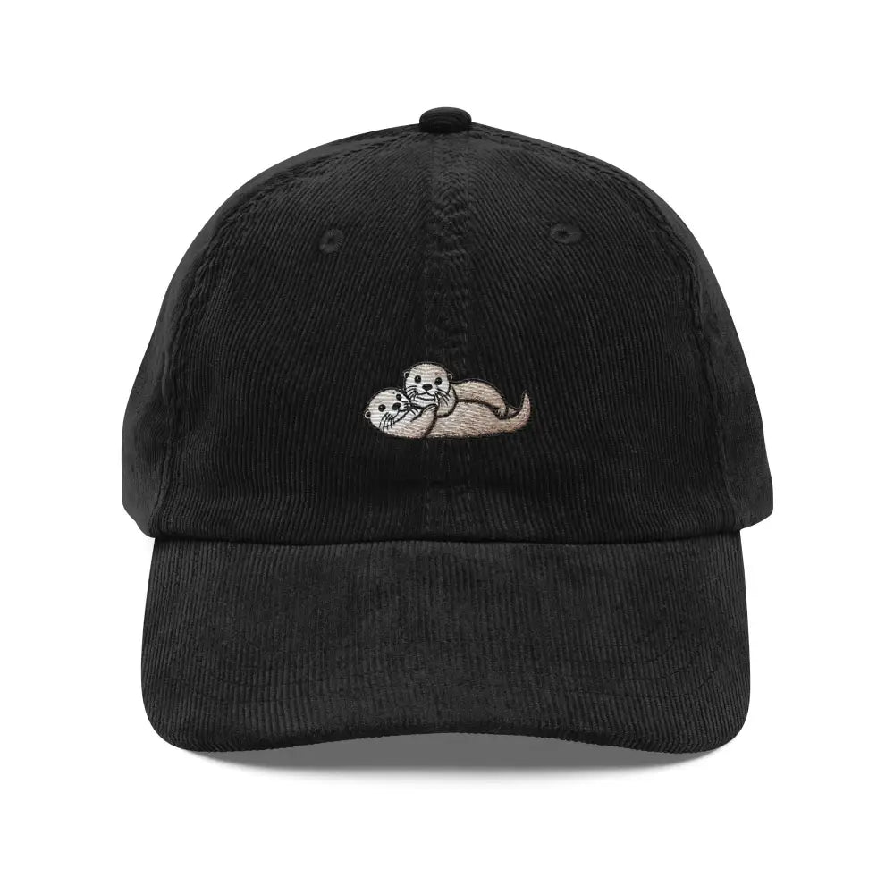 Black embroidered corduroy cap with cuddling otters