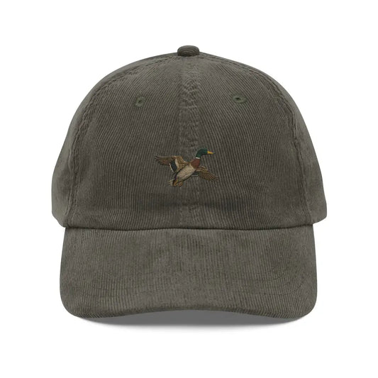 Embroidered flying duck on Trini Skies corduroy hat with a stylish baseball cap design