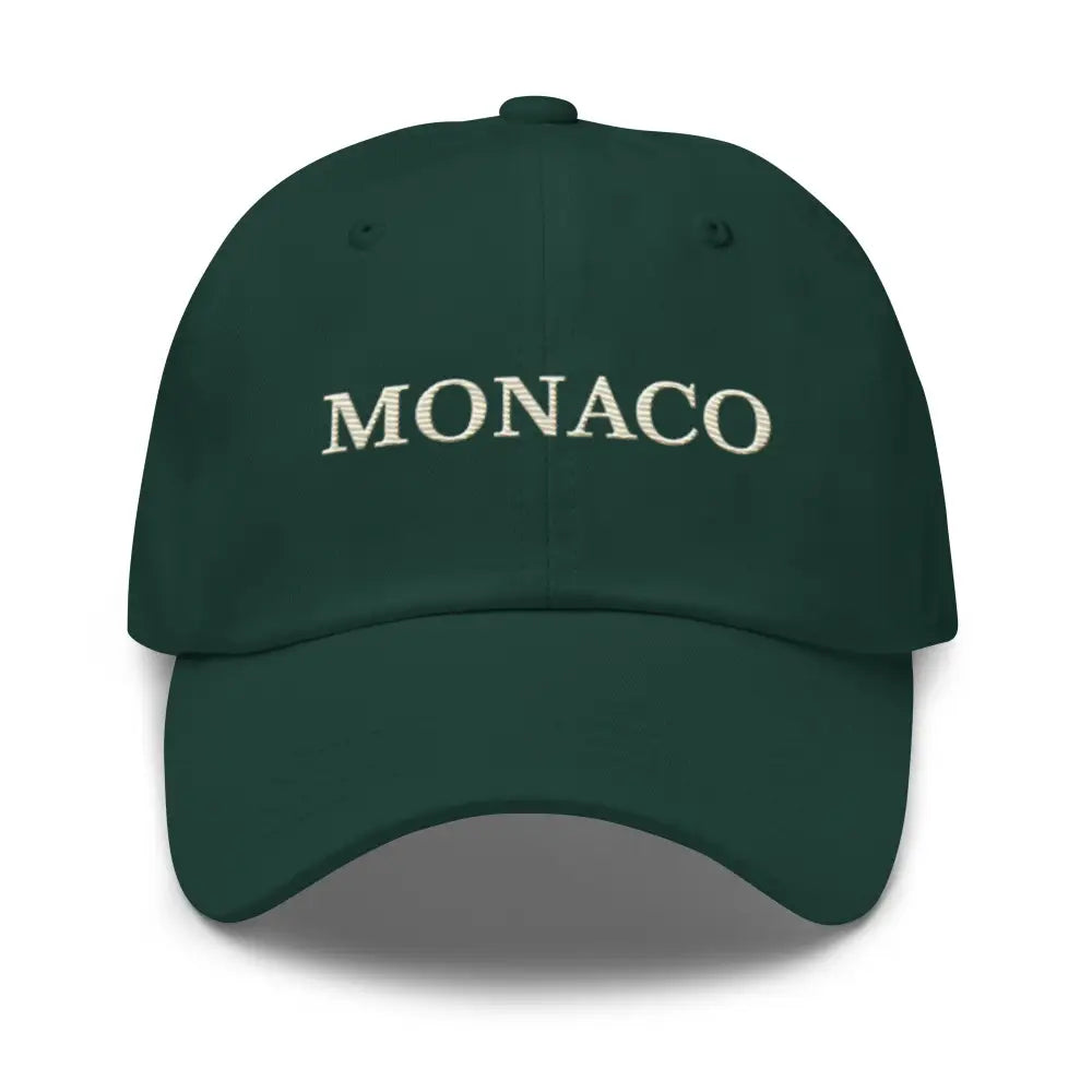 Dark green Trini Skies embroidered Monaco dad hat with white MONACO text