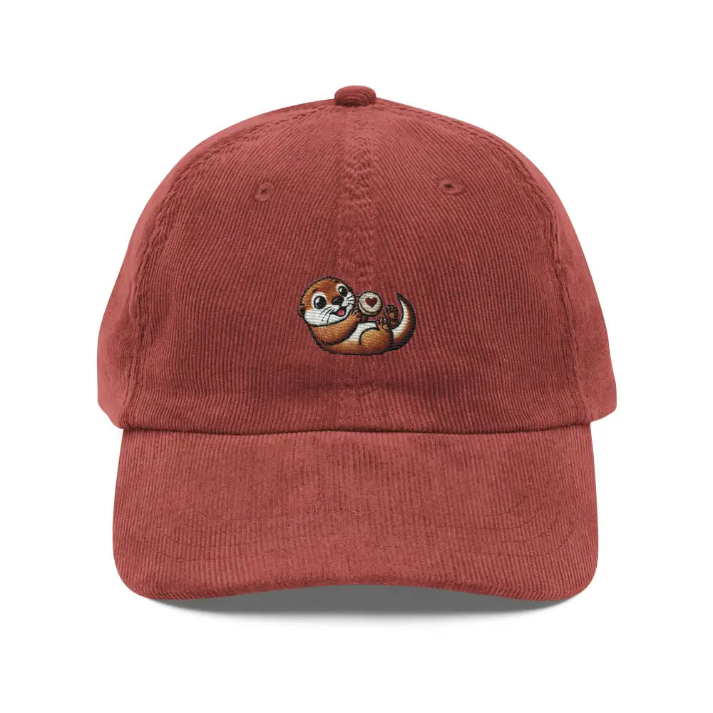 Red corduroy cap with embroidered playful otter holding heart rock vintage by Trini Skies