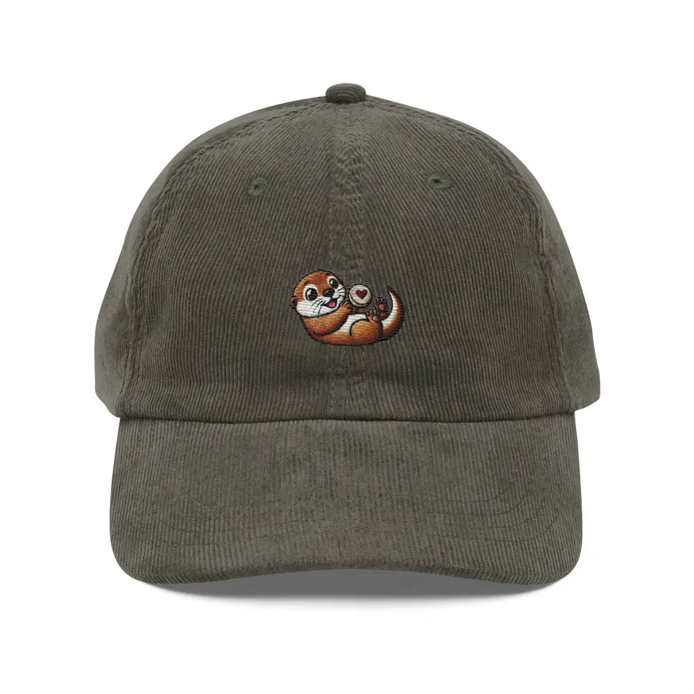Embroidered playful otter with heart rock on Trini Skies corduroy cap